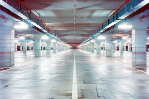 LED light tube underground parking scene This image shows how the emergency LED linear light in the underground parking scene offers bright, energy-efficient lighting that enhances visibility and safety.